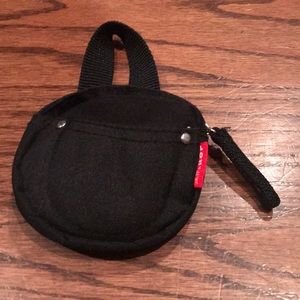 Pacifier holding. Attaches to any bag or belt loop